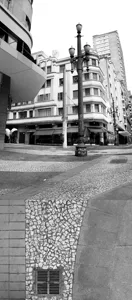 Both photos assembled in a way that the sidewalk lines had to continue seamlessly